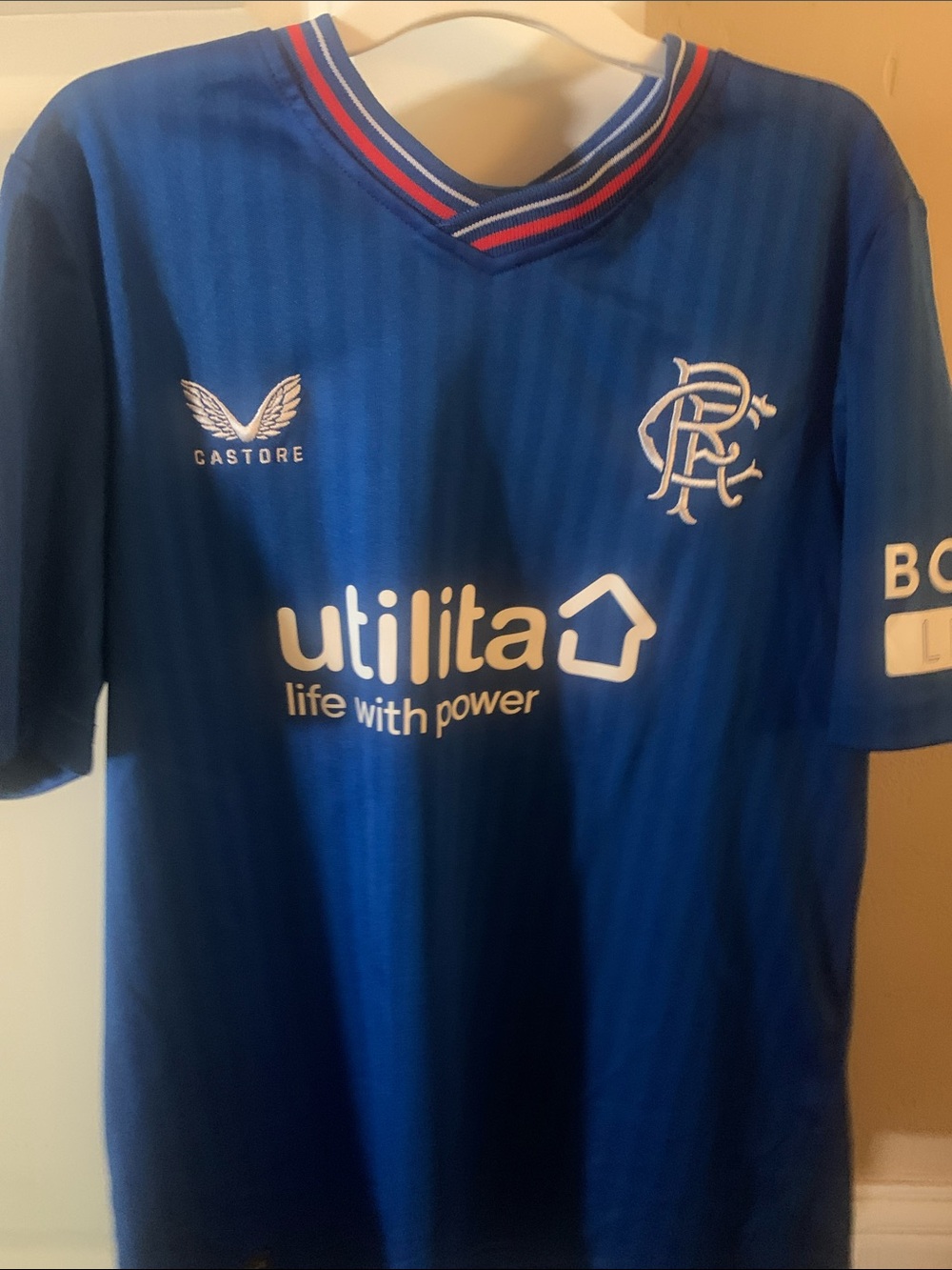 Castore Kids Blue Rangers Home Jersey with Utilita Sponsor